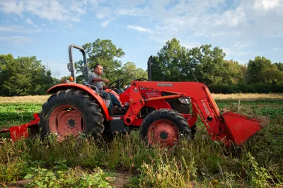 Vicente Gonzalez moves his tractor at his farm in Bodcaw, Ark. on Sept. 7, 2023. Photo by Rory Doyle.